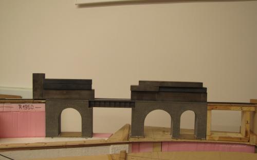 Gluing the bridge model (from 3D printing) in our layout